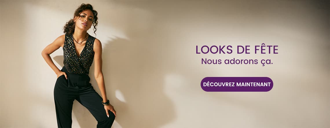 Looks de fête - Nous adorons ça. Découvrez maintenant - Femme en tenue festive avec haut noir et pantalon élégant, pose confiante