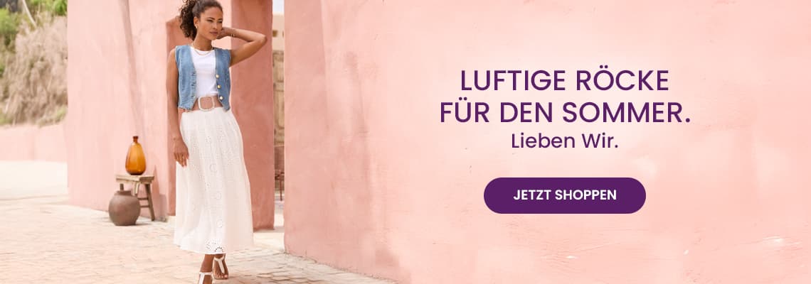 Luftige Röcke für den Sommer – Frau in langem Spitzenrock steht vor rosa Wand, Button mit Text Jetzt shoppen